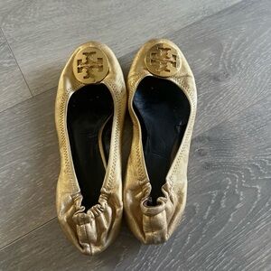 Tory Burch gold flats